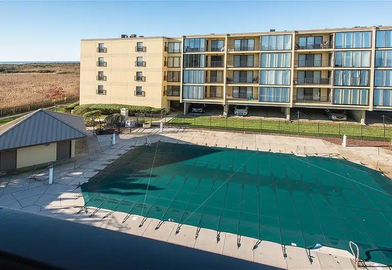 Brigantine Island Beach Resort pool from an upper floor, covered for the off-season