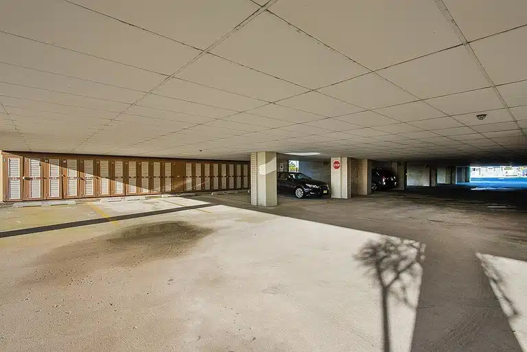 Covered parking and storage lockers under a Brigantine Island Beach Resort building