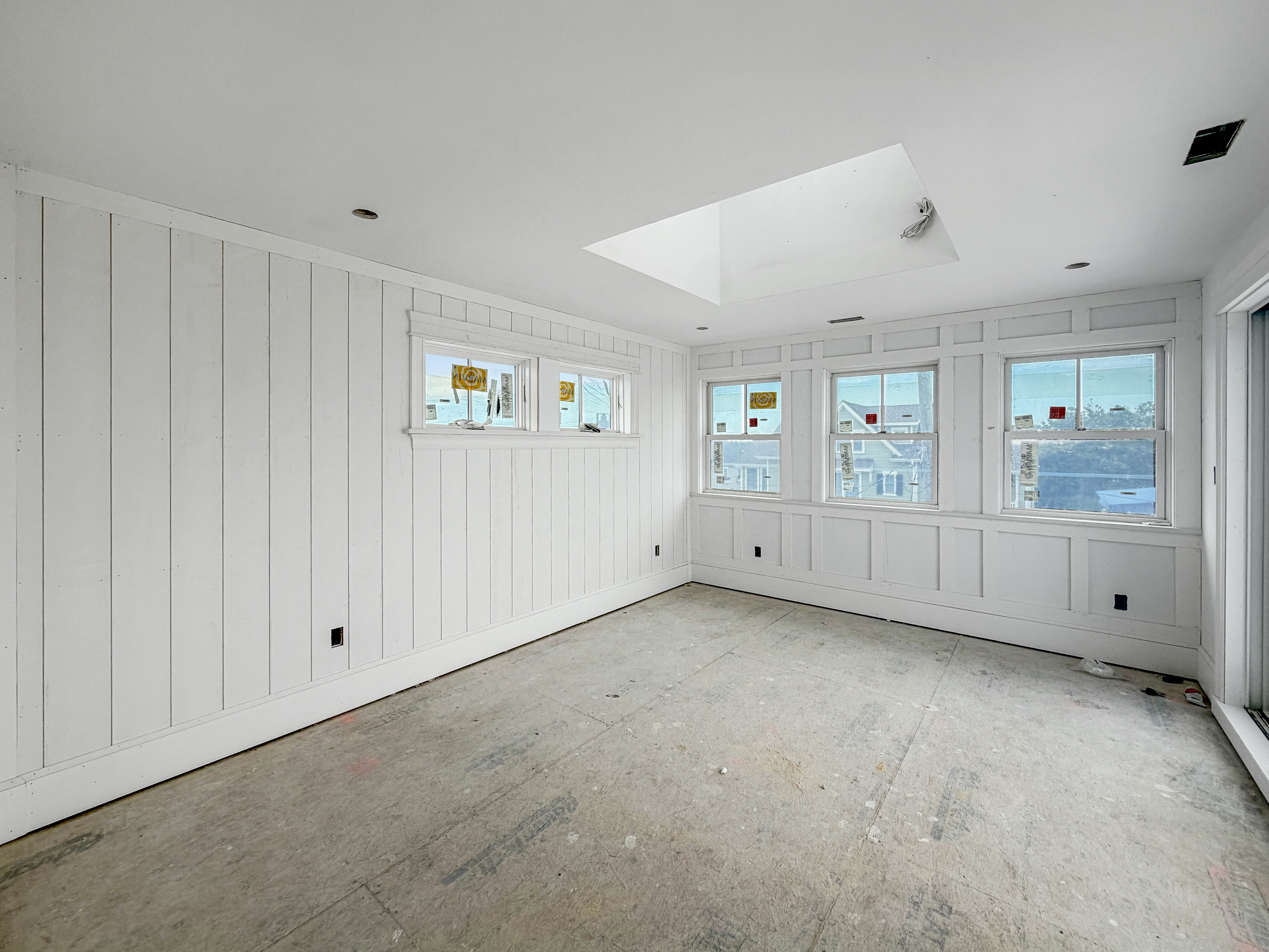 Interior progress at 905 Seacrest Rd, June 2026 — finished walls and skylight