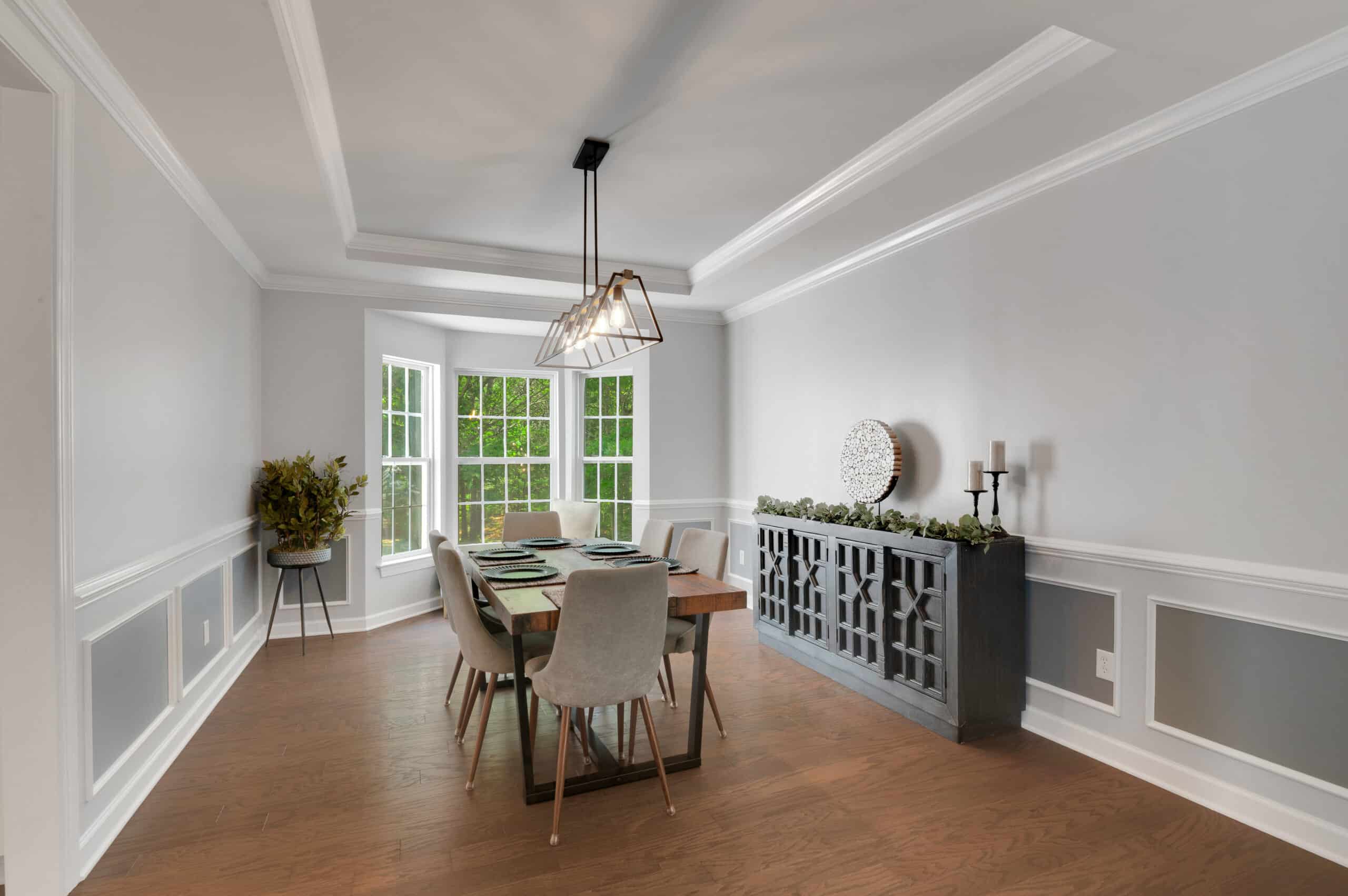 Professional real estate listing photograph of a formal dining room