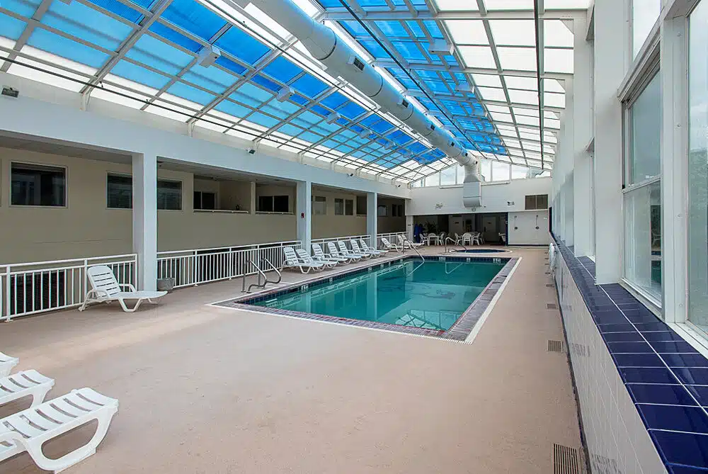 Indoor pool deck under the glass roof at Watson's Regency, Ocean City NJ