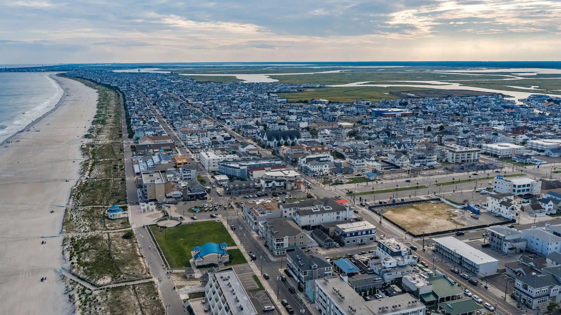 Aerial view of Sea Isle City, NJ, with the beach on one side and the back bay on the other
